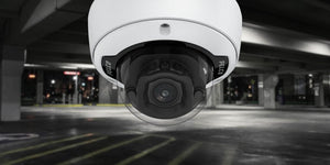 Pelco Sarix Professional 4 Series Dome Camera with parking garage in the background